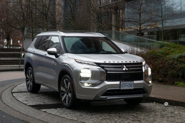 2026 Mitsubishi Outlander PHEV silver model front parked on street