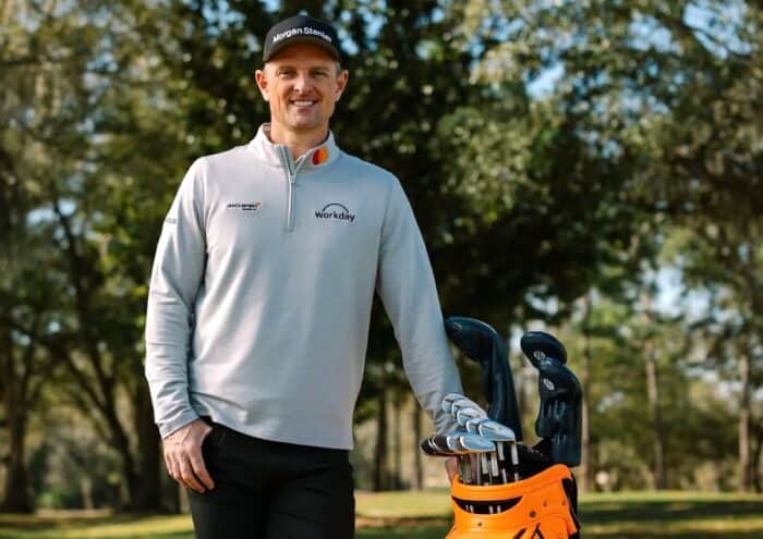 Justin Rose with McLaren golf clubs