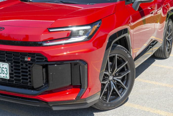 2026 Toyota RAV4 GR Sport front 3 quarter view of wheel, grill, and headlight