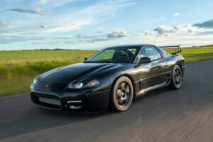 1999 Mitsubishi 3000GT VR4 front rolling shot on the street
