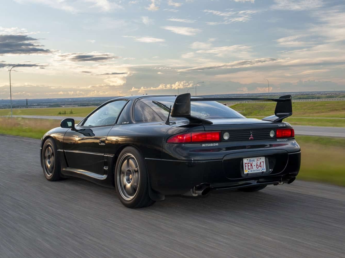 1999 Mitsubishi 3000GT VR4 rear rolling on the street