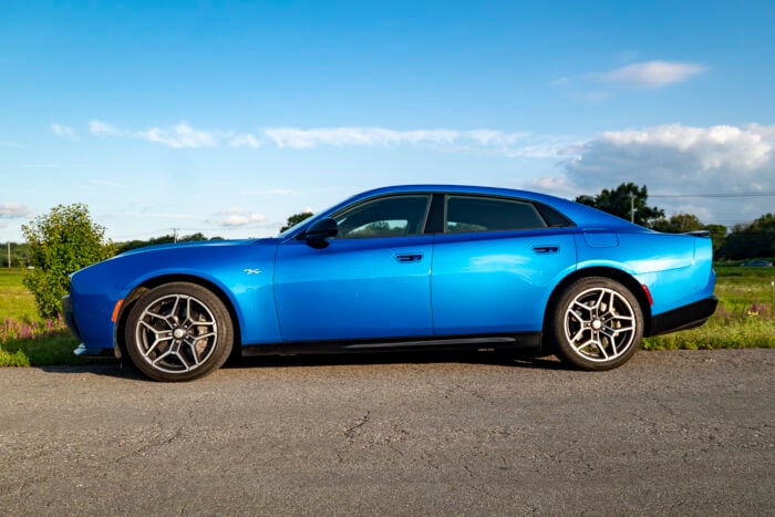 Blue 2026 Dodge Charger R/T Plus side view parked on road