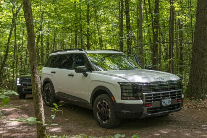 2026 Hyundai Palisade XRT PRO front parked in the woods off roading