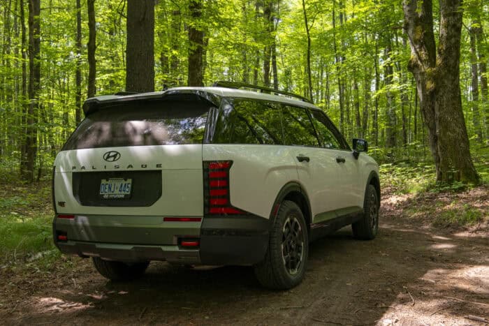 2026 Hyundai Palisade XRT PRO rear off roading in the woods