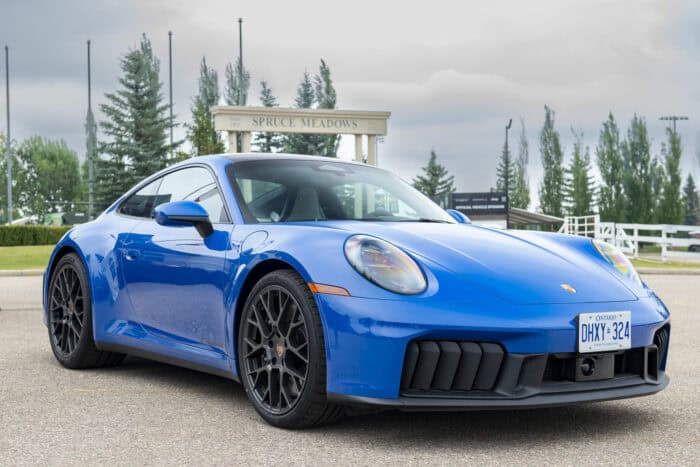 Blue 2026 Porsche 911 Carrera GTS front parked on road