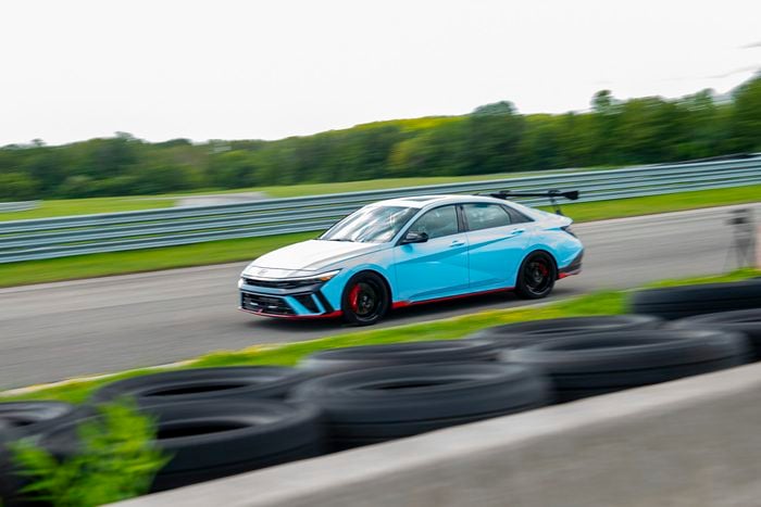 2026 Hyundai Elantra N TCR Edition driving by fast at the track CTMP