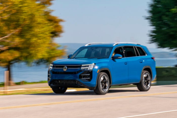 2027 Volkswagen Atlas SEL Premium R-Line front driving by fast
